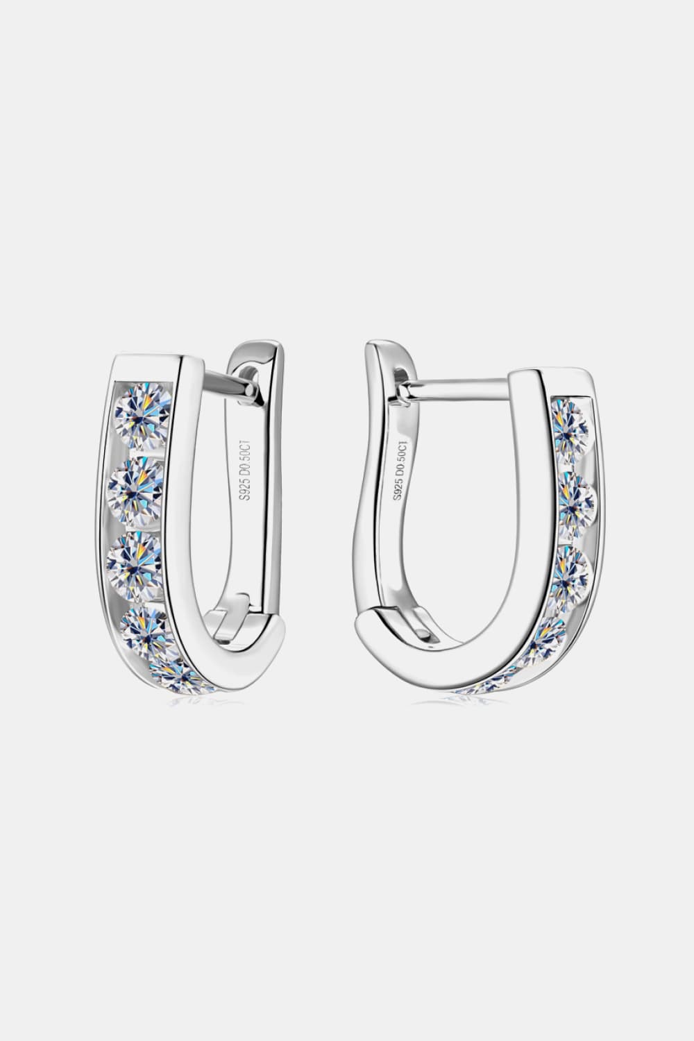 Side view of Elegant Moissanite Earrings showcasing reflective cut and silver setting.