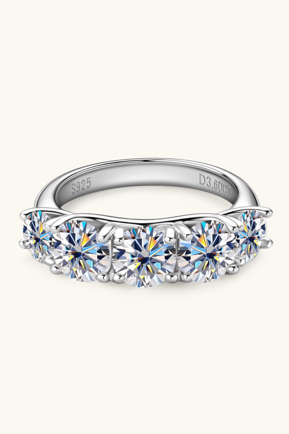 Angle view showing the stone detail of the half eternity Moissanite Ring