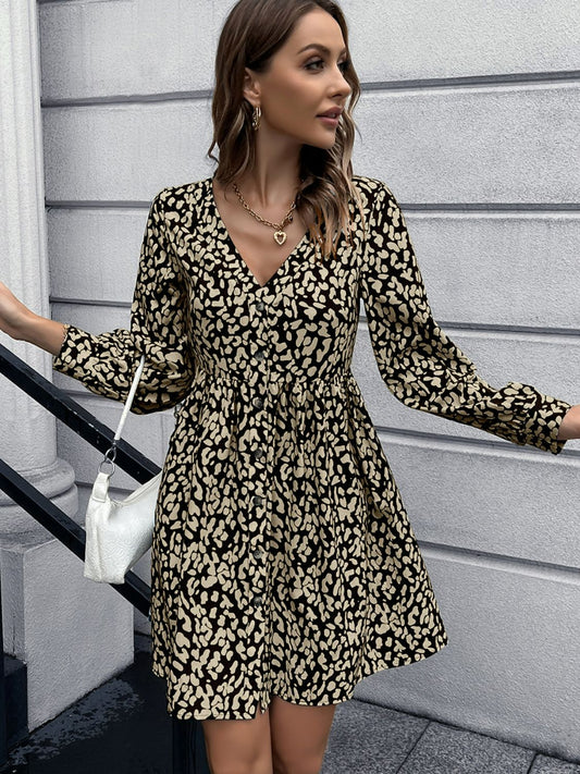 Ivy Lane Animal Print Buttoned V-Neck Long Sleeve Dress – Fierce animal print with flattering V-neck and belted waist.